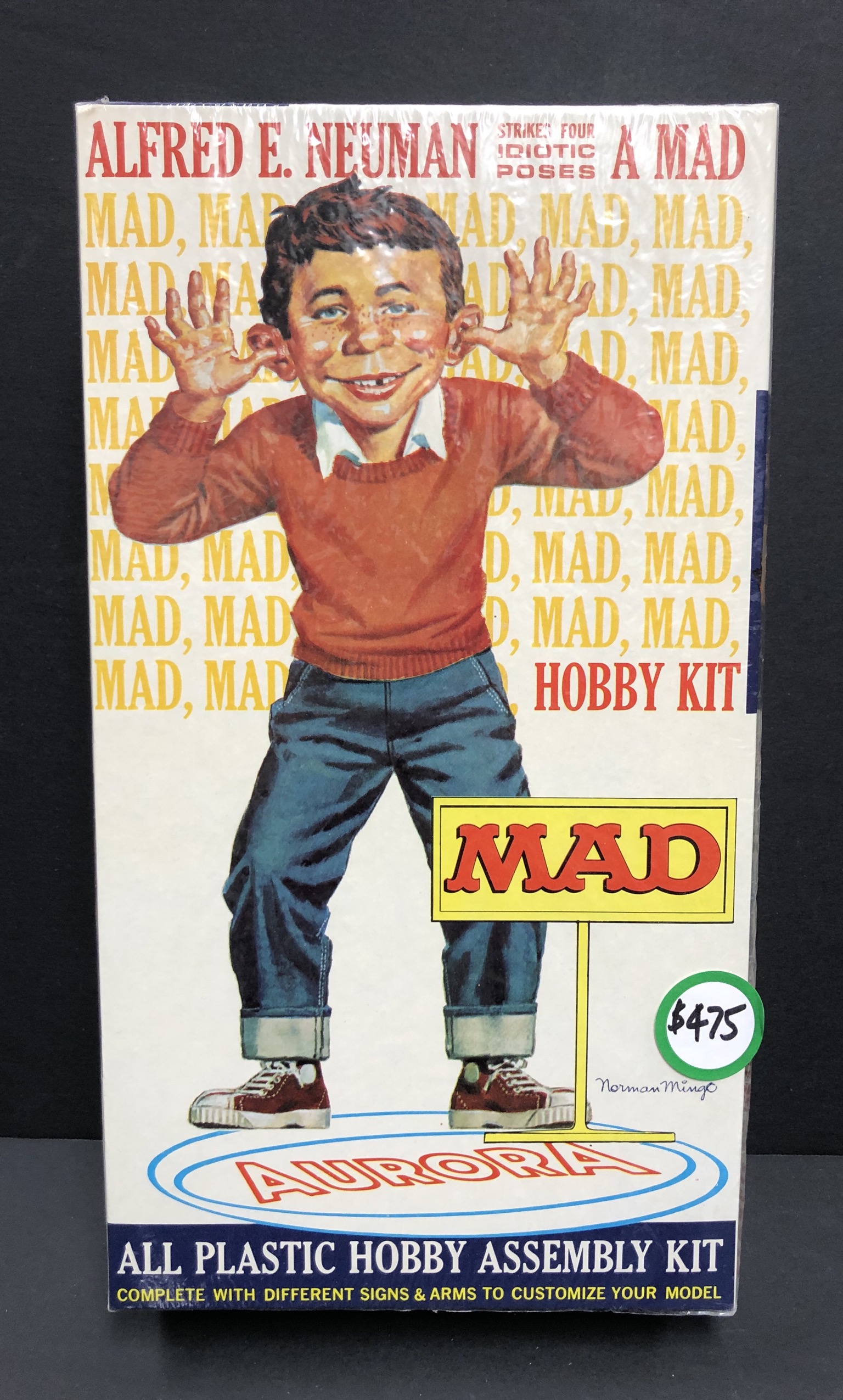 ALFRED E. NEUMAN